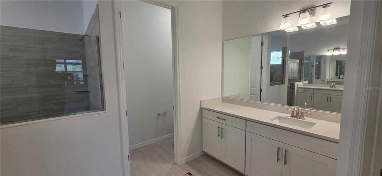 Furnished interior view inside a new home in Calusa Country Club, Lakewood Ranch (Image 7).