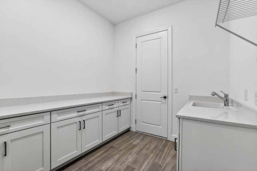 Furnished interior view inside a new home in Center Lake Ranch Community Group Page, St. Cloud (Image 12).