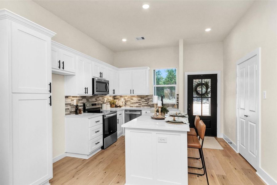 Furnished interior view inside a new home in , Point Blank (Image 12).