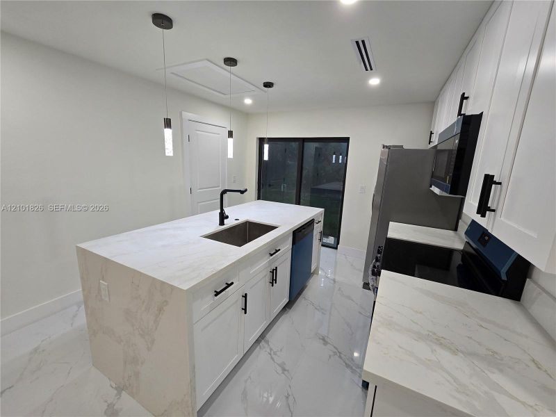 Furnished interior view inside a new home in , Lehigh Acres (Image 10).