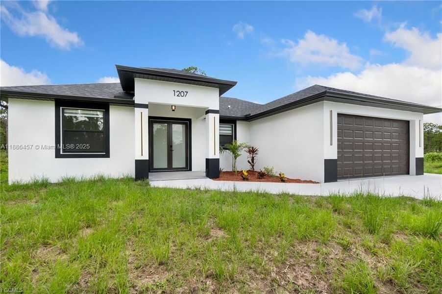 Exterior details and patio area of a home in , Lehigh Acres (Image 11). Exterior details and patio area of a home in , Lehigh Acres (Image 11).