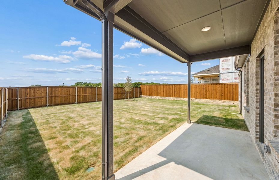 Exterior details and patio area of a home in Wilson Creek Meadows, Celina (Image 3).