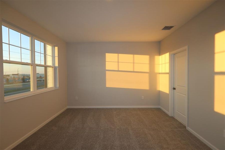 Spacious, unfurnished interior of a new home in Tribute at Ovation, Winter Garden (Image 43). Spacious, unfurnished interior of a new home in Tribute at Ovation, Winter Garden (Image 43).