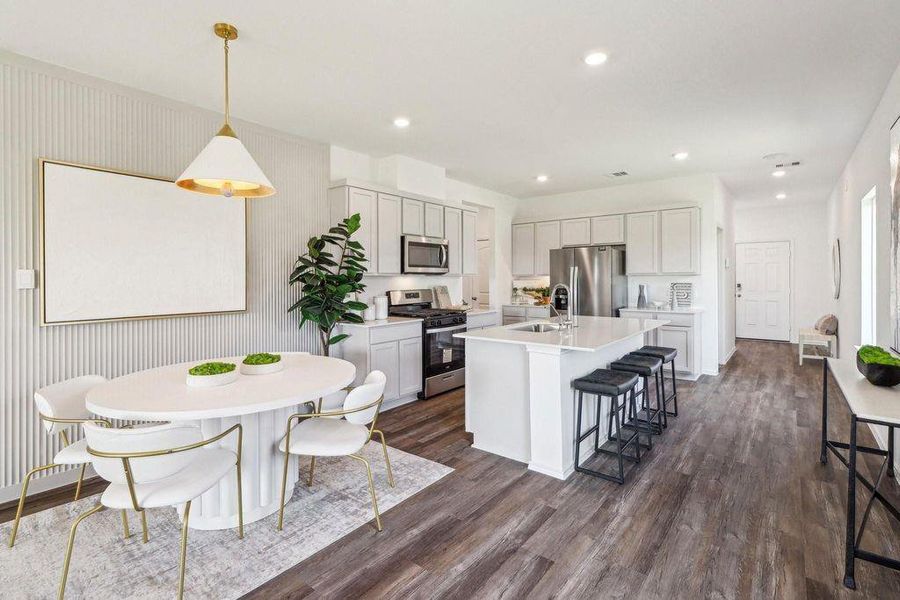 Furnished interior view inside a new home in Sunterra, Katy (Image 4).