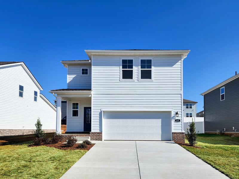 Front exterior of a new home in Barton Hills, Spring Hill, TN, highlighting curb appeal (Image 1). Front exterior of a new home in Barton Hills, Spring Hill, TN, highlighting curb appeal (Image 1).