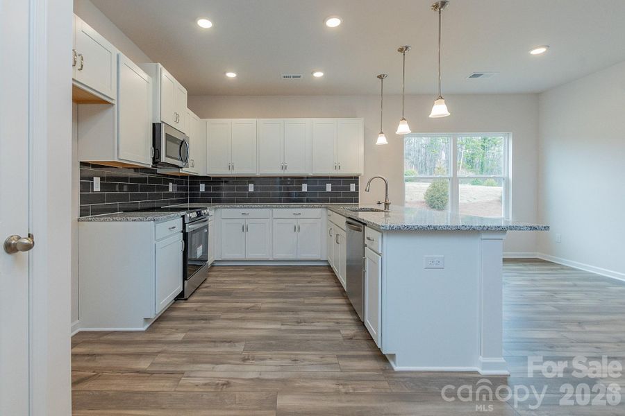 Furnished interior view inside a new home in Country Club Village, Salisbury (Image 10).