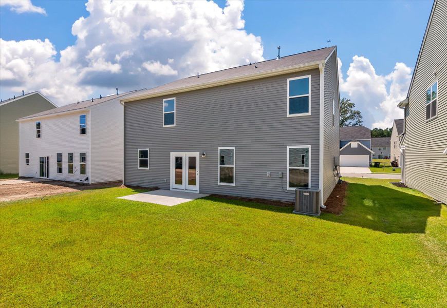 Front exterior of a new home in Oakley Pointe, Moncks Corner, SC, highlighting curb appeal (Image 19).