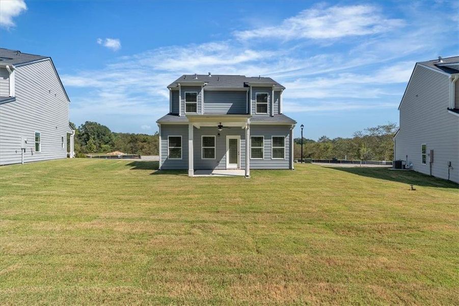 Exterior details and patio area of a home in The View at Groover's Lake, Lithia Springs (Image 3).