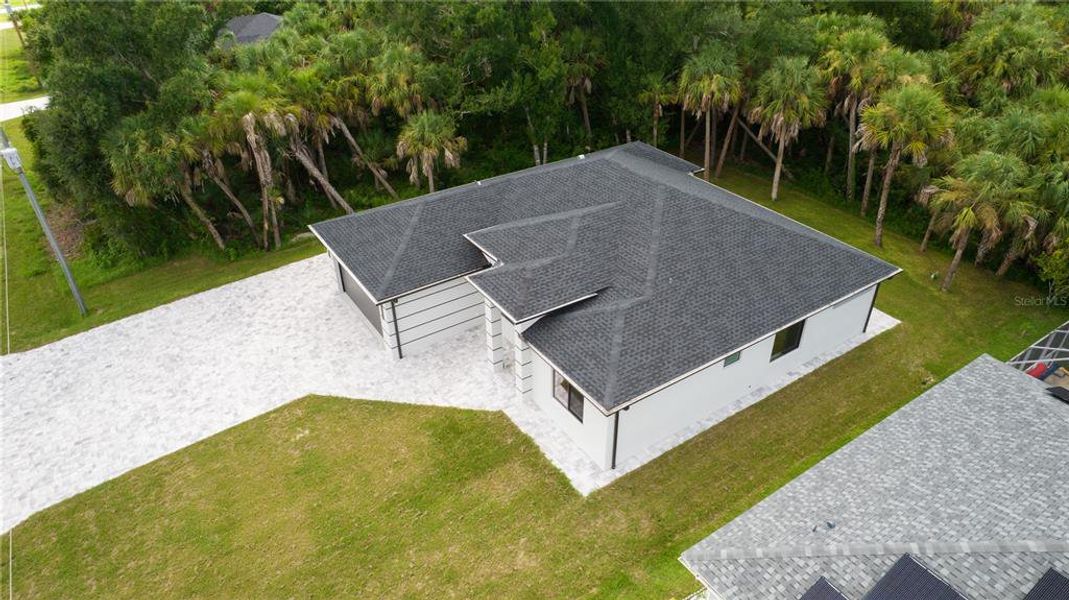 Front exterior of a new home in , North Port, FL, highlighting curb appeal (Image 27).
