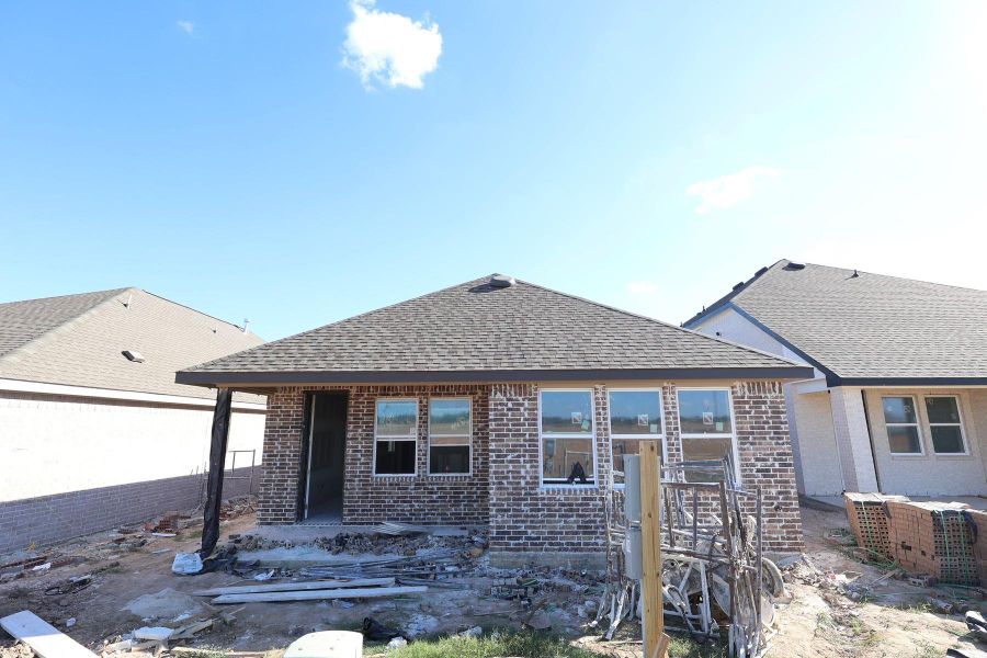 Backyard with covered patio- still under construction!