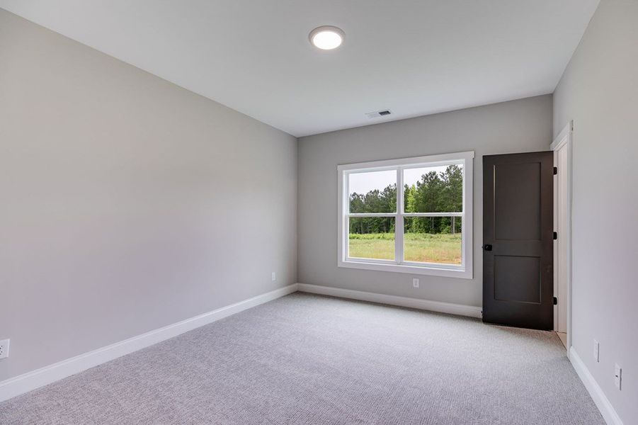Spacious, unfurnished interior of a new home in Harmon Springs, Carrollton (Image 37).