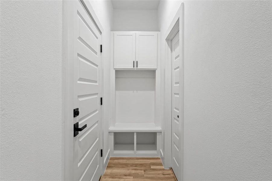 Mudroom featuring light hardwood / wood-style floors