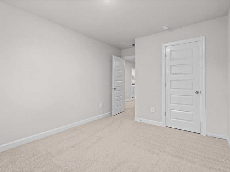 Spacious, unfurnished interior of a new home in Crossing at Abner Creek Townes, Greer (Image 17).