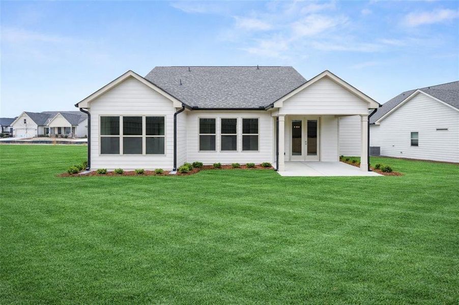 Exterior details and patio area of a home in Soleil Summit Chase, Snellville (Image 28).