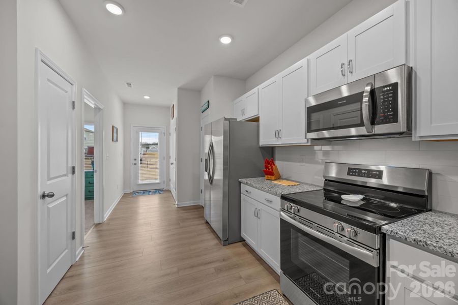 Furnished interior view inside a new home in Country Club Village, Salisbury (Image 15).
