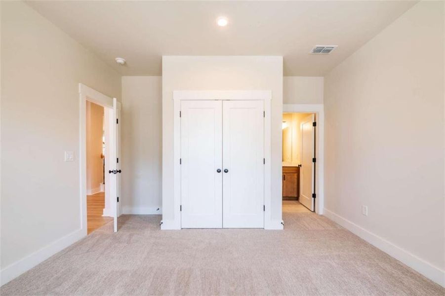 Spacious, unfurnished interior of a new home in The Paddocks at Doc Hughes, Buford (Image 25).