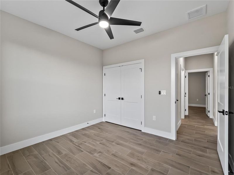 Spacious, unfurnished interior of a new home in , Port Charlotte (Image 43).