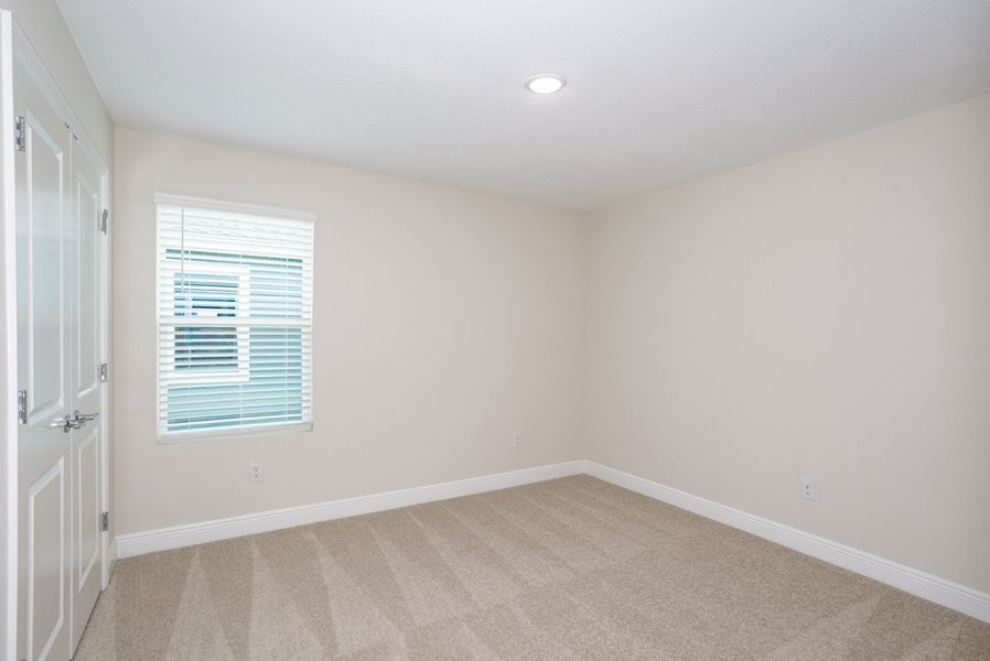 Spacious, unfurnished interior of a new home in Pasadena Landing, Wesley Chapel (Image 23).