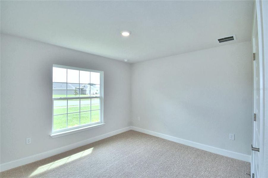 Spacious, unfurnished interior of a new home in Cadence Crossing, Auburndale (Image 26).