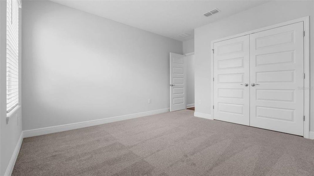 Spacious, unfurnished interior of a new home in Waterleigh, Winter Garden (Image 34). Spacious, unfurnished interior of a new home in Waterleigh, Winter Garden (Image 34).