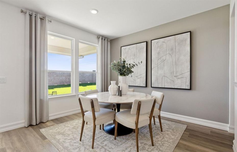 *Model Representation - Dining nook off kitchen with large windows