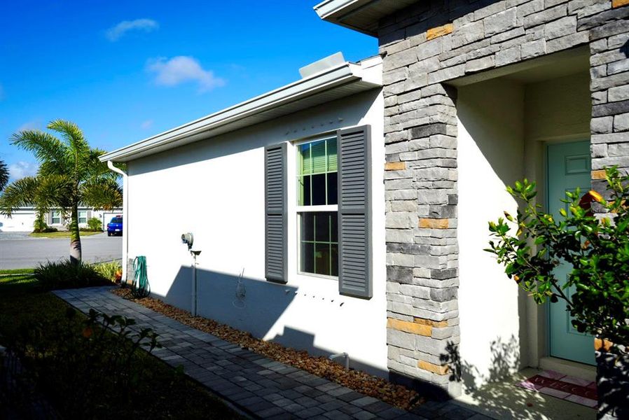 Exterior details and patio area of a home in , Port Charlotte (Image 36).
