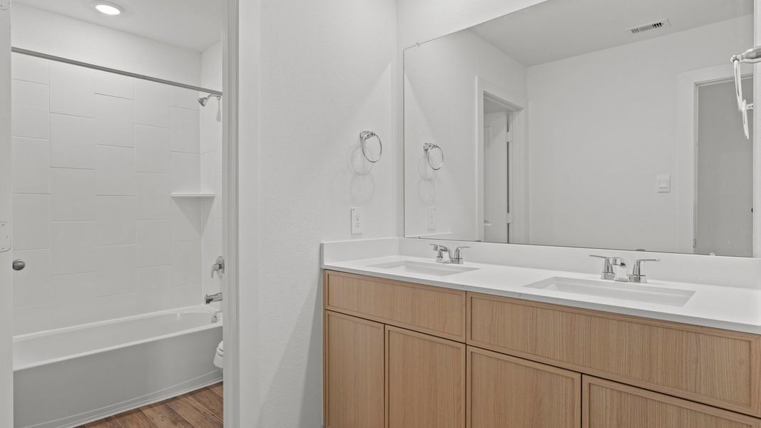 Furnished interior view inside a new home in Villarosa at Tamarron, Katy (Image 15).