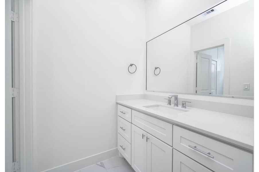 Representative furnished interior of a home built from the The Emma by Riverway Homes in The Heights Haus Collection, Houston (Image 5).