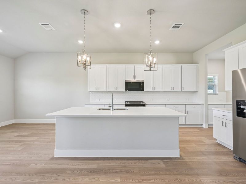 Furnished interior view inside a new home in Lakehaven - Premier Series, Farmersville (Image 7).