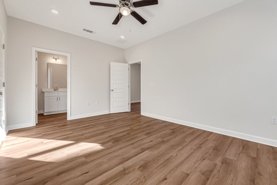 Spacious, unfurnished interior of a new home in Live Oak Cottages, Freeport (Image 22). Spacious, unfurnished interior of a new home in Live Oak Cottages, Freeport (Image 22).