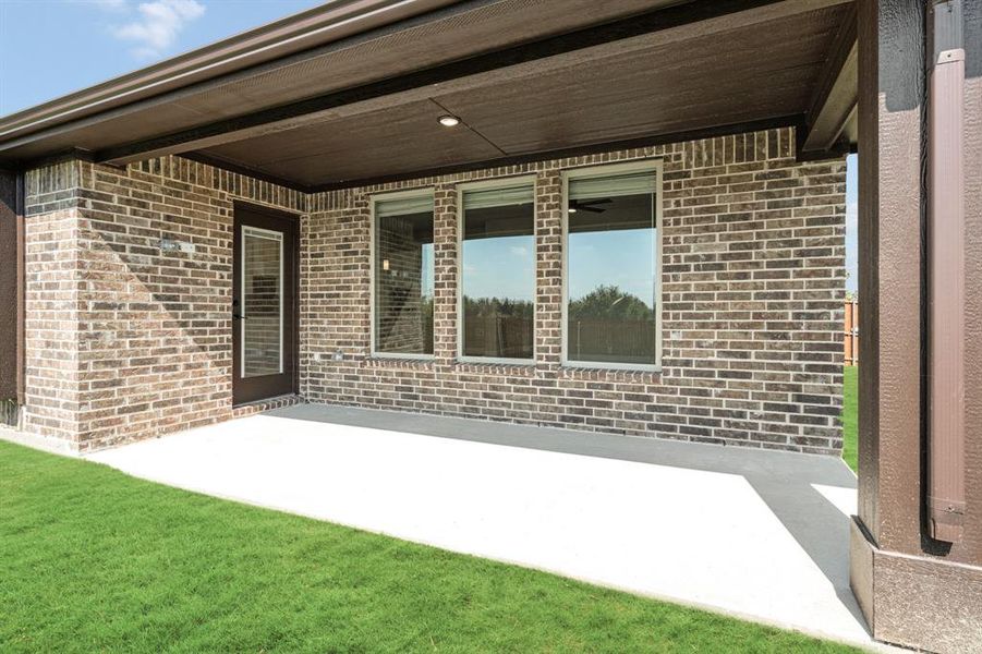 Exterior details and patio area of a home in The Grove, Midlothian (Image 18). Exterior details and patio area of a home in The Grove, Midlothian (Image 18).