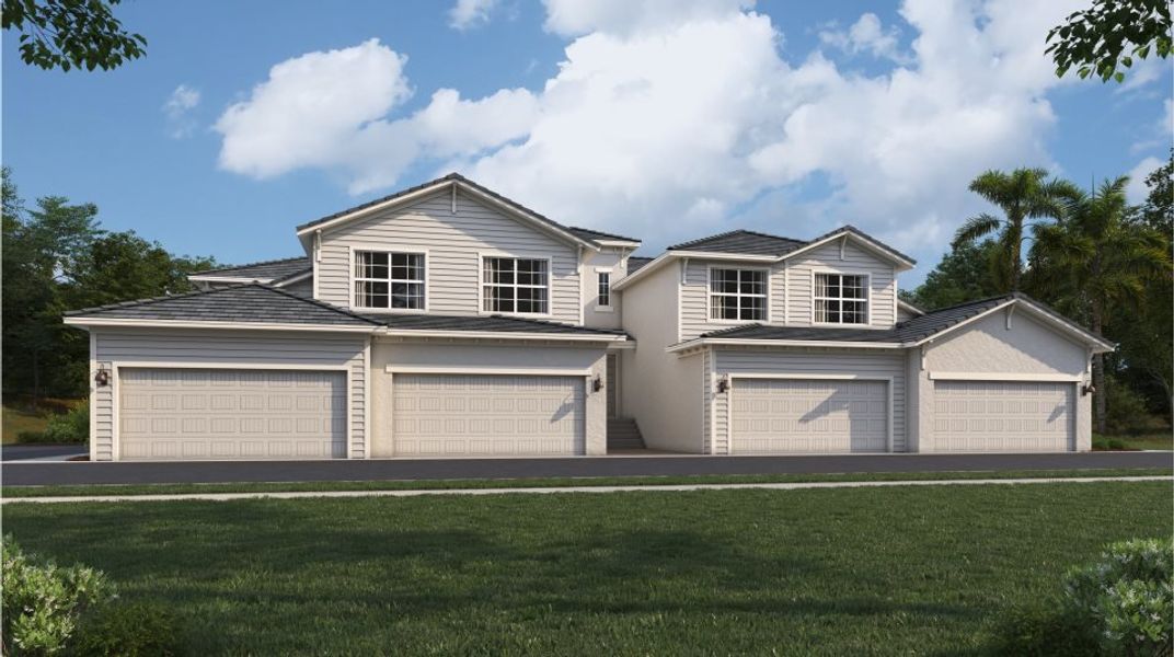 Front exterior of a new home in Willowgreen at Babcock Ranch: Front Load Coach Homes, Punta Gorda, FL, highlighting curb appeal (Image 1).