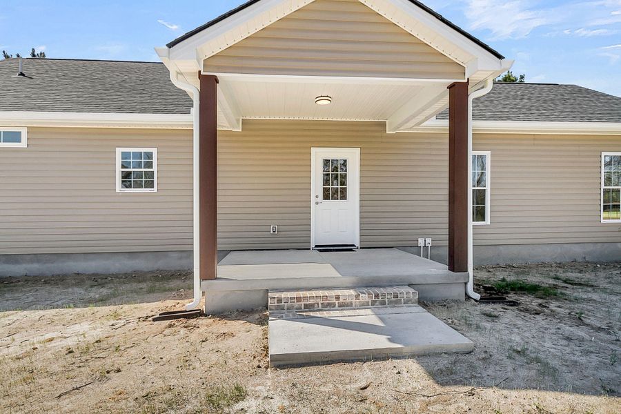 Exterior details and patio area of a home in , Round O (Image 4).