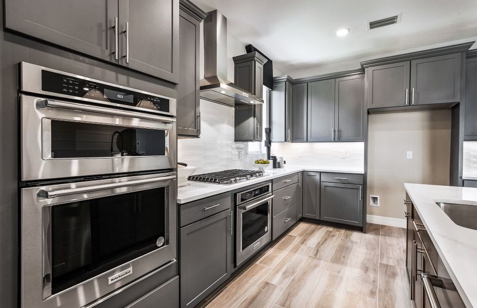 Representative furnished interior of a home built from the Easley by DiVosta in Emerson Oaks, Vero Beach (Image 32).