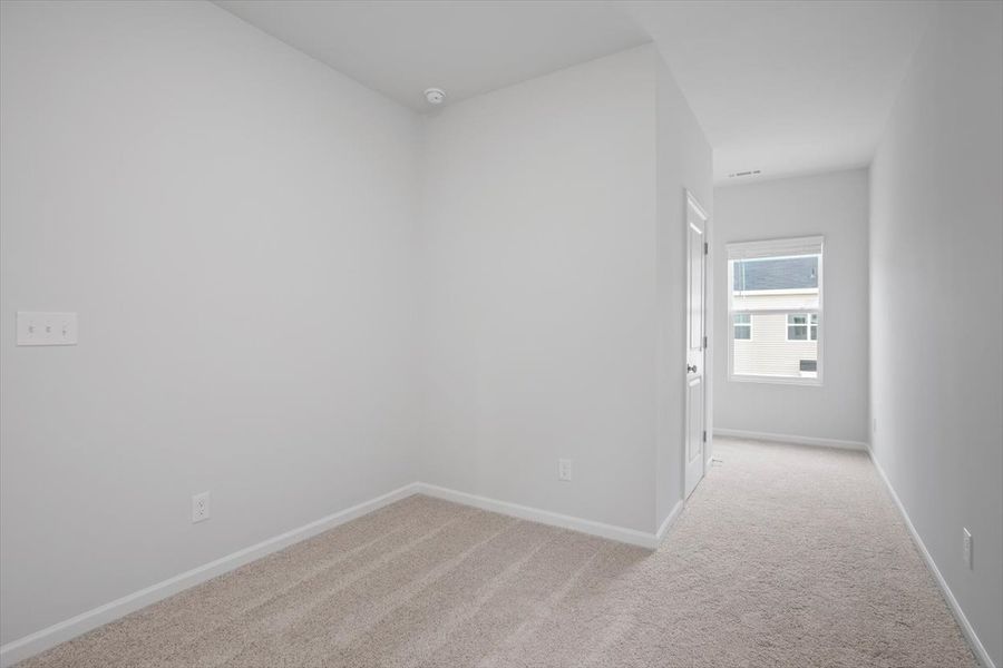Spacious, unfurnished interior of a new home in Renaissance at White Oak, Garner (Image 26).