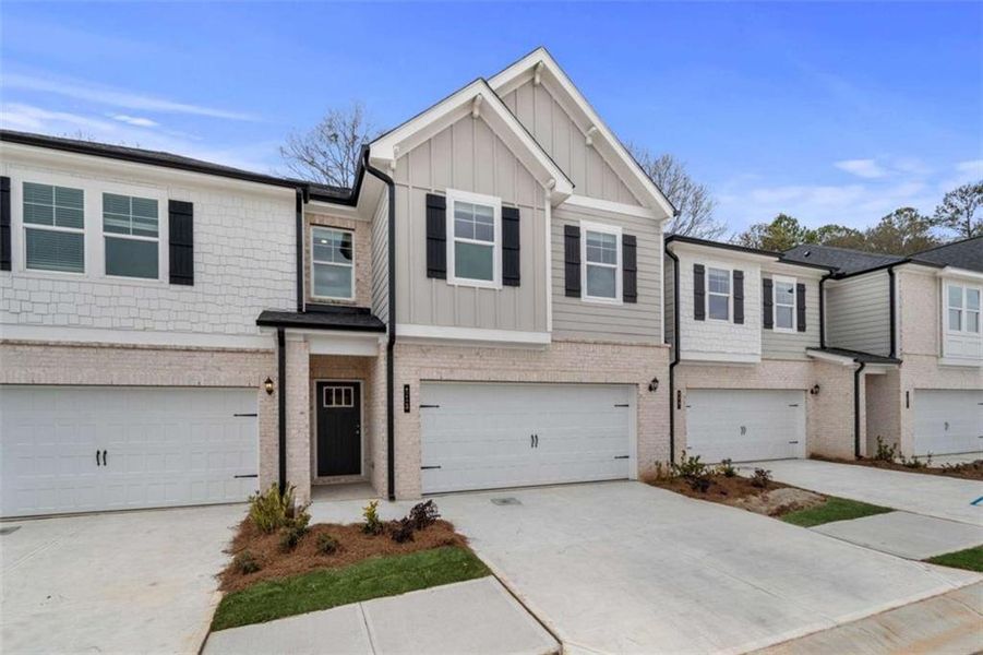 Front exterior of a new home in Diamante, Stockbridge, GA, highlighting curb appeal (Image 22).