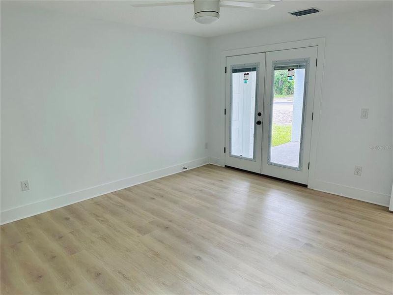 Master Bedroom with french doors to rear porch