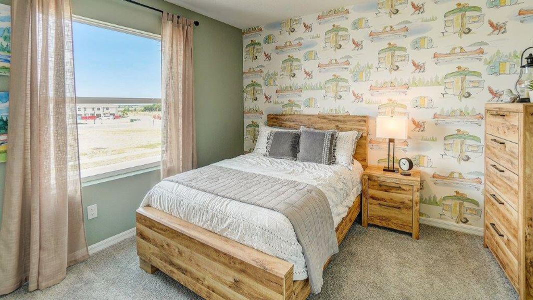 Furnished interior view inside a new home in Woodcreek, Wesley Chapel (Image 6).