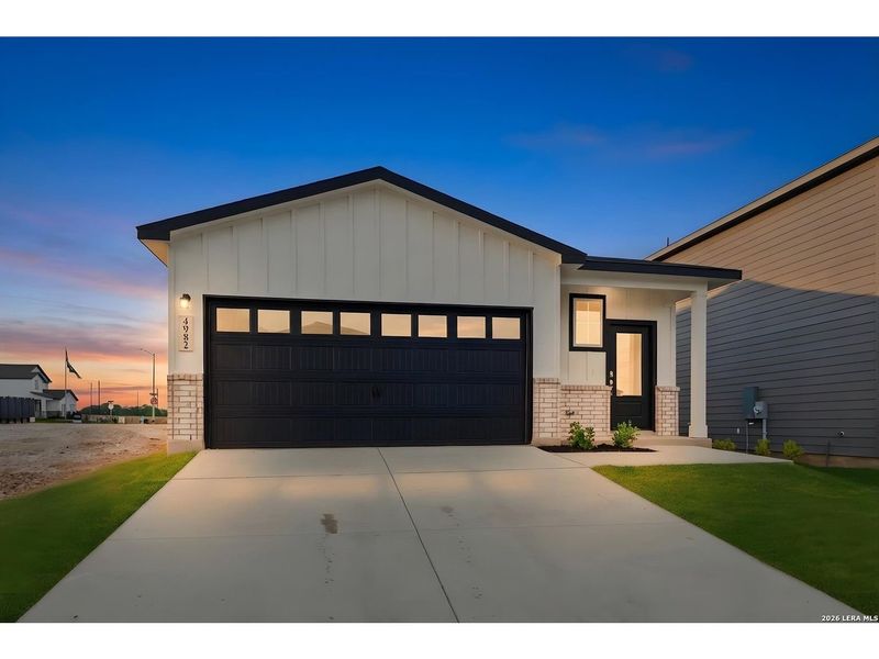 Front exterior of a new home in Agave, San Antonio, TX, highlighting curb appeal (Image 1). Front exterior of a new home in Agave, San Antonio, TX, highlighting curb appeal (Image 1).