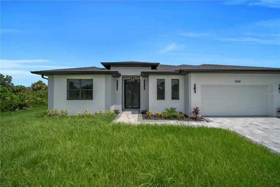 Exterior details and patio area of a home in , North Port (Image 3).