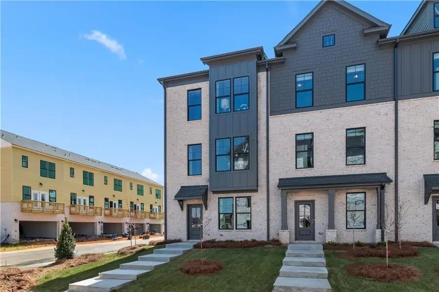 Front exterior of a new home in Silverock, McDonough, GA, highlighting curb appeal (Image 1). Front exterior of a new home in Silverock, McDonough, GA, highlighting curb appeal (Image 1).