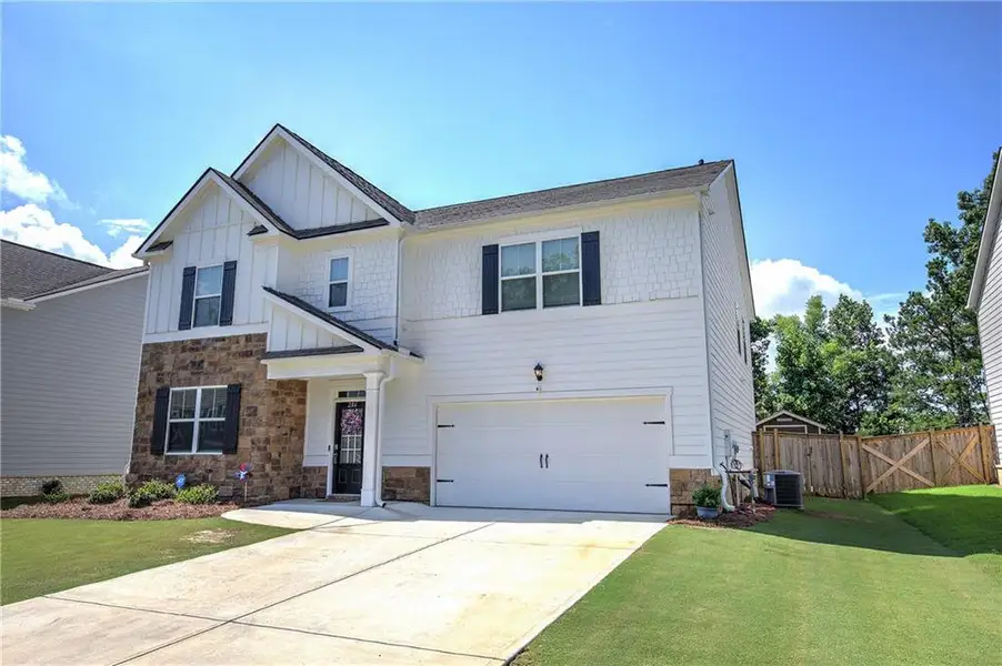 Front exterior of a new home in , Cartersville, GA, highlighting curb appeal (Image 2). Front exterior of a new home in , Cartersville, GA, highlighting curb appeal (Image 2).