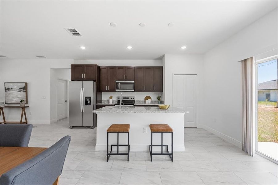 Furnished interior view inside a new home in , Ocala (Image 14).
