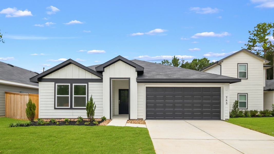 Representative exterior photo of a completed home built from the Texas Cali by D.R. Horton in New Waverly Station, New Waverly, TX (Image 2). Representative exterior photo of a completed home built from the Texas Cali by D.R. Horton in New Waverly Station, New Waverly, TX (Image 2).