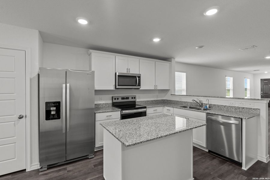Furnished interior view inside a new home in Cinco Lakes, San Antonio (Image 7).
