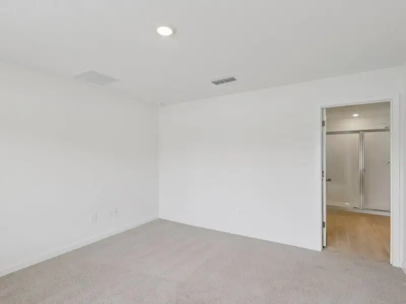 Spacious, unfurnished interior of a new home in Flagler Village - Signature Series, Palm Coast (Image 12).