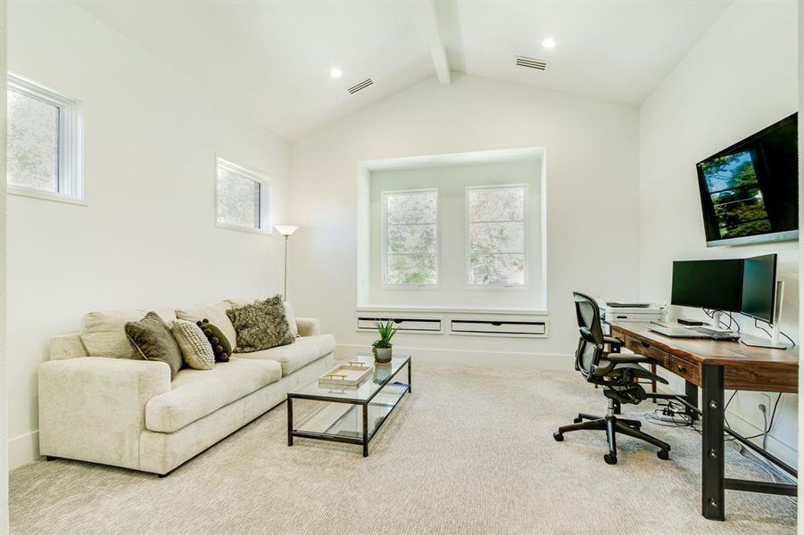 upstairs office with vaulted ceilings