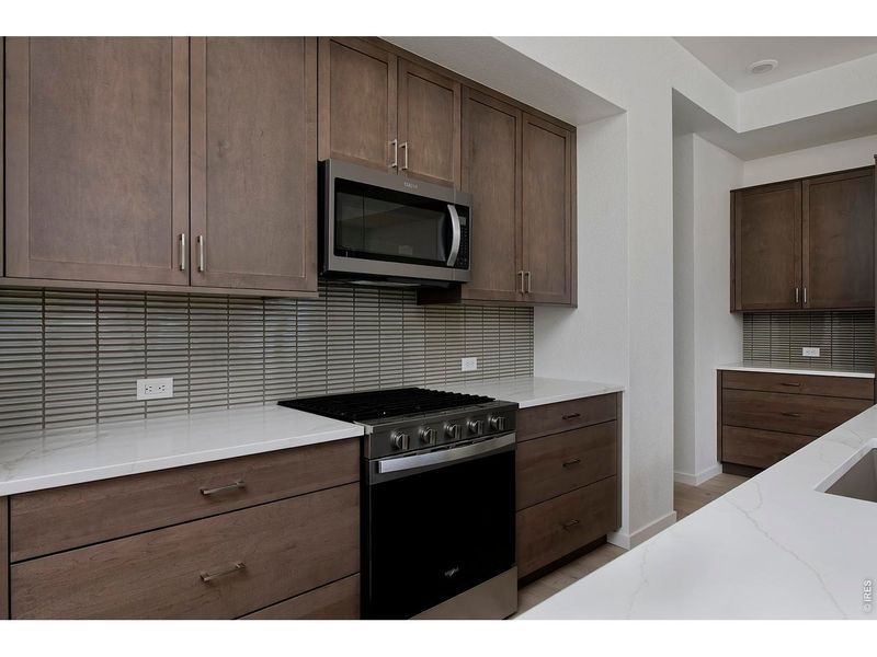 Furnished interior view inside a new home in West Grange, Longmont (Image 11).