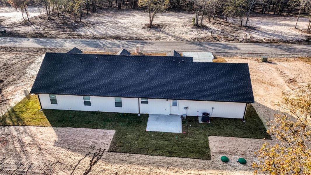 Exterior details and patio area of a home in , Poolville (Image 4).