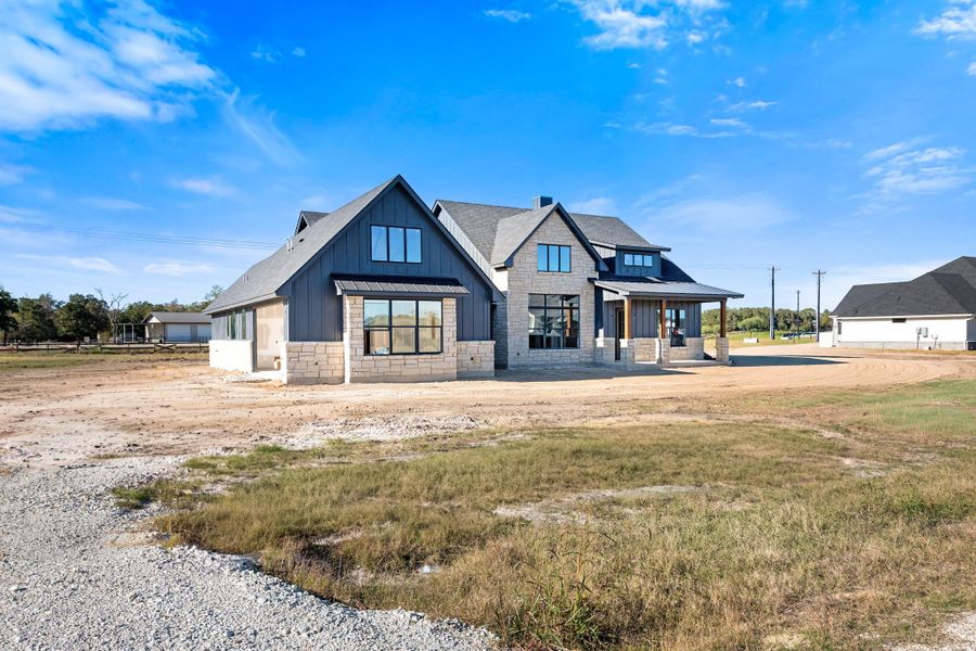 Front exterior of a new home in , Bryan, TX, highlighting curb appeal (Image 5). Front exterior of a new home in , Bryan, TX, highlighting curb appeal (Image 5).